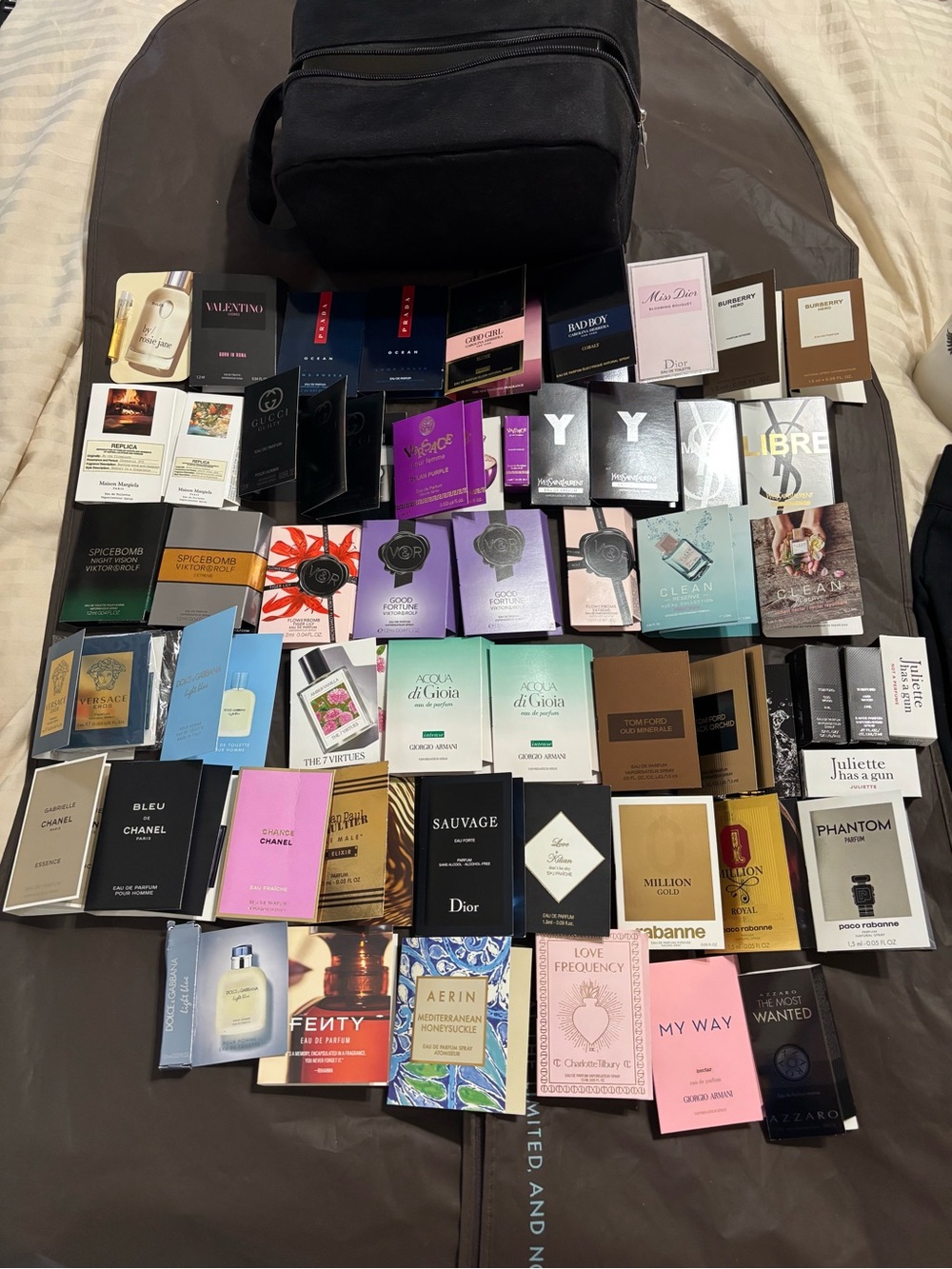Bundle of 50+ Assorted Designer Perfume and Cologne samples with Black Bag